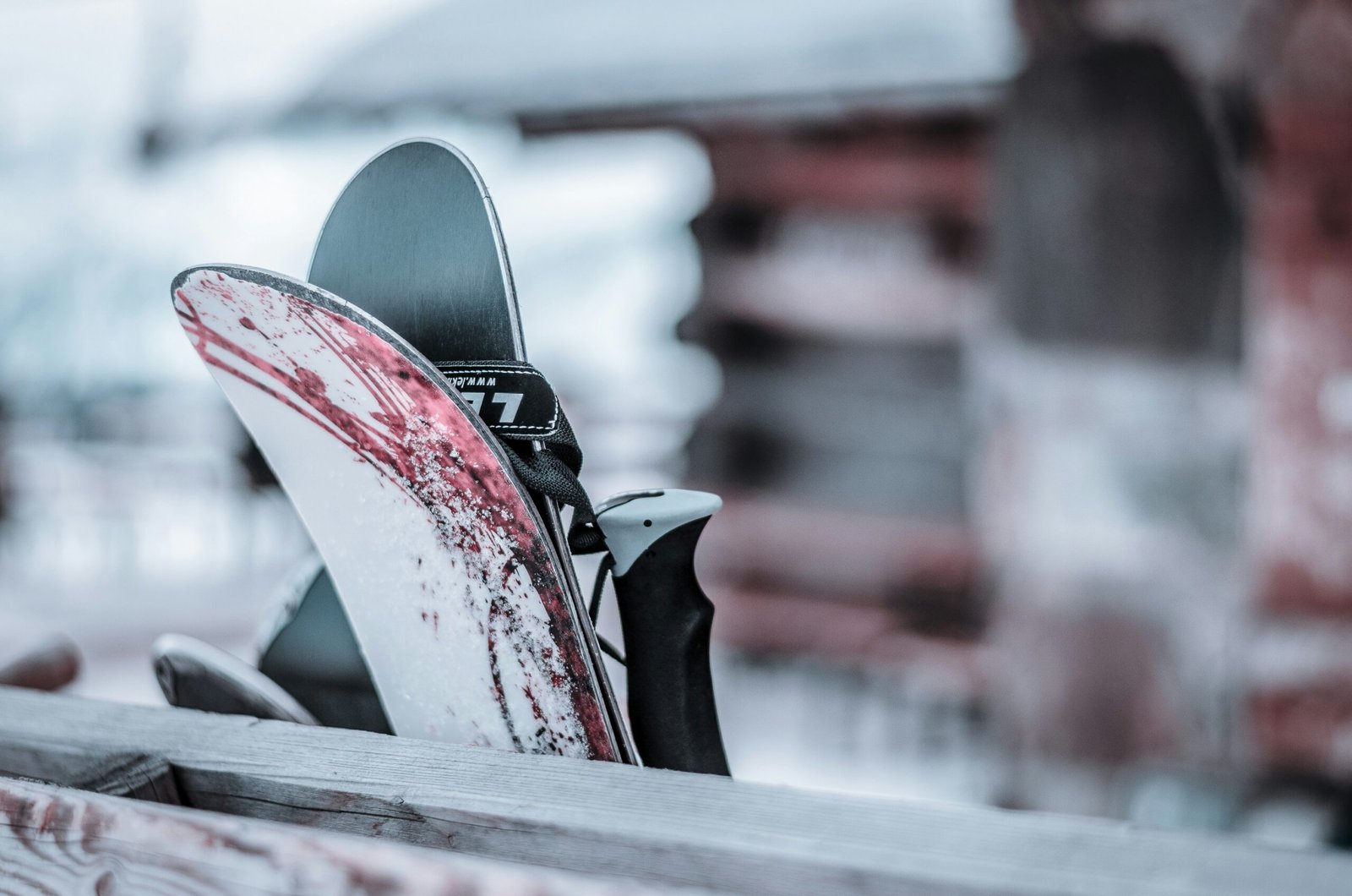 white, red, and black skateboard